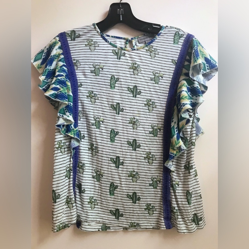 Cactus print Anthropologie ruffled T-shirt with blue trim.